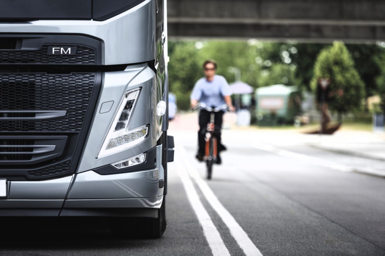 Volvo FM with cyclist