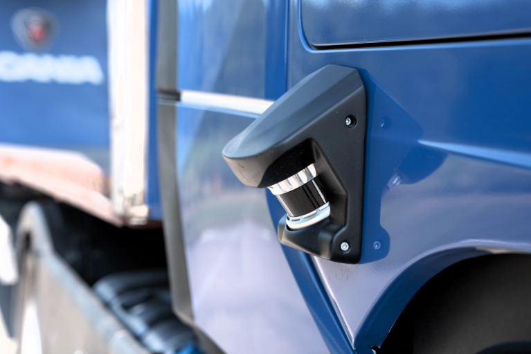 LIDAR sensors mounted on the side of the cab roof of a Scania autonomous truck.