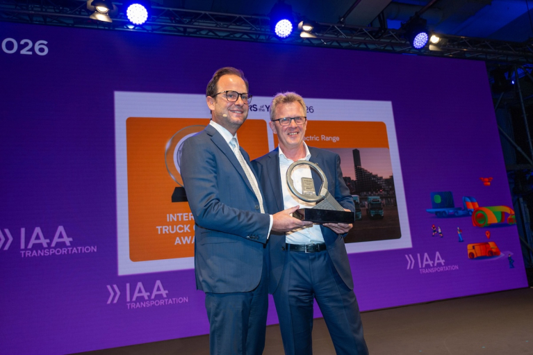 Florian Engel and Volvo Trucks President Roger Alm with the International Truck of the Year 2027 award at IAA Transportation in Hanover.